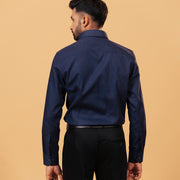 Model back view wearing navy blue Giza dobby shirt