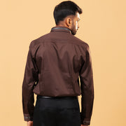 Model back view wearing dark brown Giza satin shirt