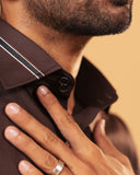 Half side collar view of dark brown Giza satin shirt on model