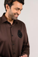 Dark brown satin shirt close-up of collar and placket detail