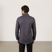 Model showing the back fit and structure of dark grey Giza satin shirt