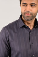 Close-up of signature double-button collar on dark grey Giza satin shirt