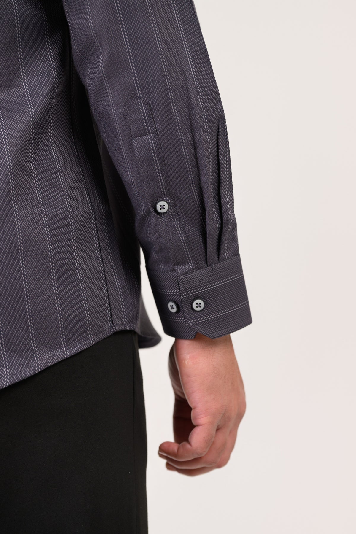 Premium dual-button cuff detail on dark grey herringbone formal shirt