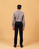 Model back view wearing dark grey plaid Giza twill shirt