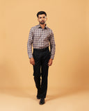 Model wearing dark grey plaid Giza twill shirt full front view