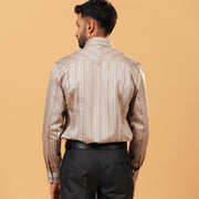 Model back view wearing earth tone satin stripe shirt