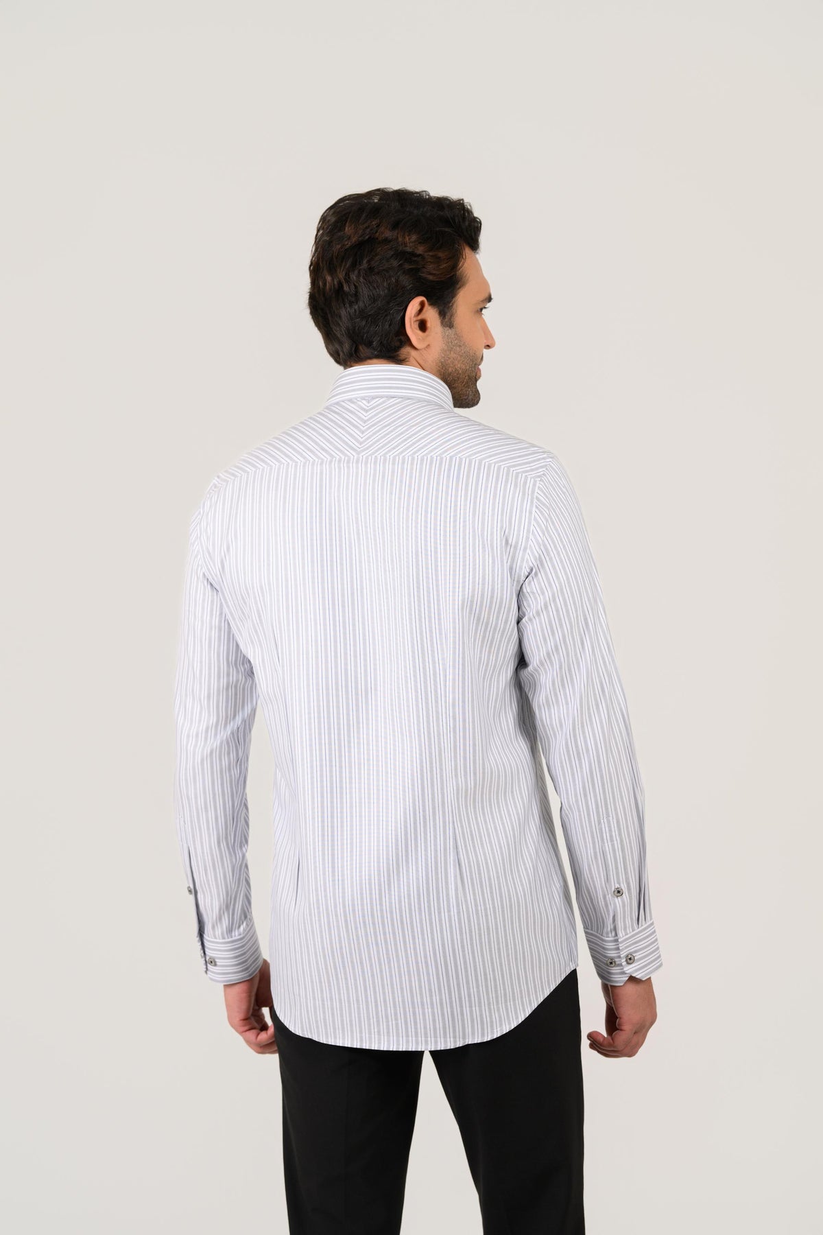 Model wearing grey striped shirt for men by Shaan & Stitch back view
