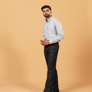 Model wearing ivory herringbone shirt full front view