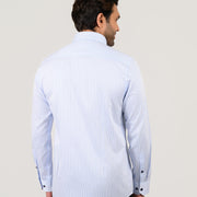 Model wearing light blue pinstripe shirt showing back fit and structure