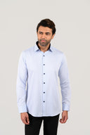 Model wearing light blue pinstripe shirt for men in smart formal style
