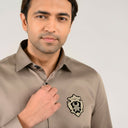 Light brown satin shirt close-up of collar and placket detail