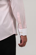 Light pink shirt cuff detail with white contrast cuff finish