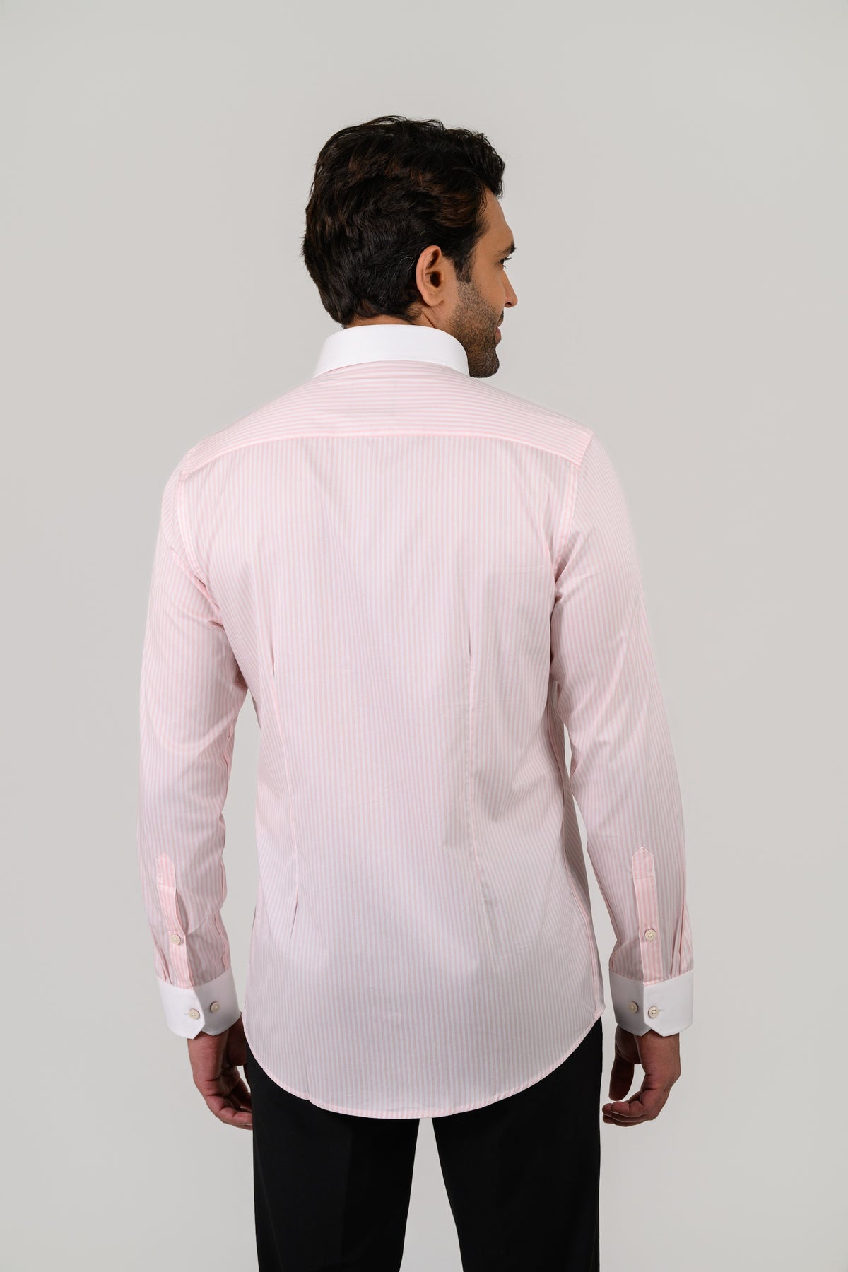 Light pink candy stripe shirt worn by model showing back fit
