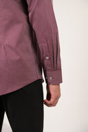 Maroon shirt cuff detail with refined micro-stripe texture