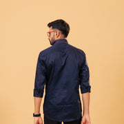 Model back view wearing navy blue Giza satin shirt