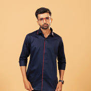 Model wearing navy blue Giza satin shirt front view