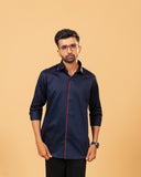 Model wearing navy blue Giza satin shirt front view