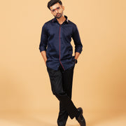 Model wearing navy blue Giza satin shirt full front view