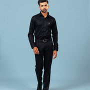 Model wearing black twill embroidered patch shirt full front view