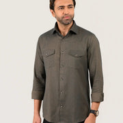 Olive green shirt for men worn by model showing full front view with folded sleeves