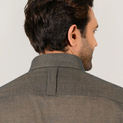 Olive green shirt for men worn by model showing back fit and style