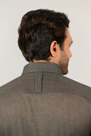 Olive green shirt for men worn by model showing back fit and style
