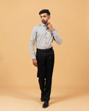 Model wearing olive and white Oxford houndstooth shirt full front view