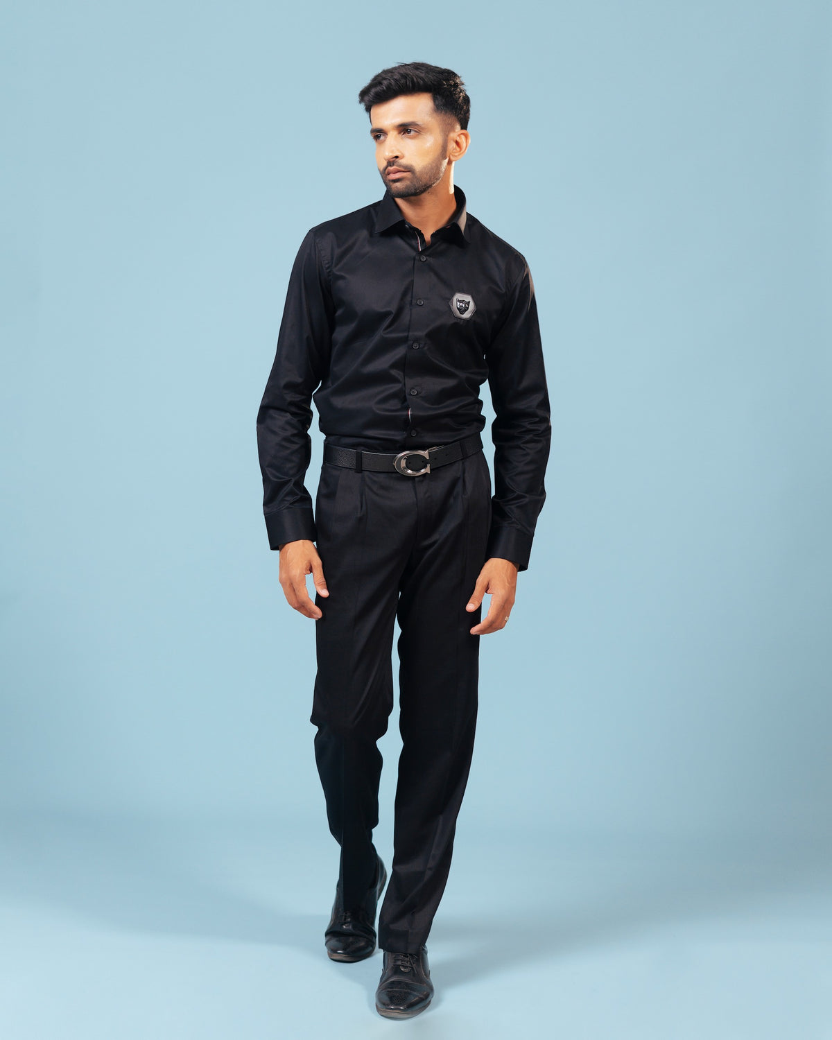 Model wearing black twill leather wolf patch shirt full front view