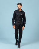 Model wearing black twill leather wolf patch shirt full front view
