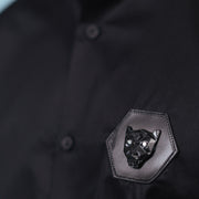 Leather wolf signature patch detail of black twill shirt