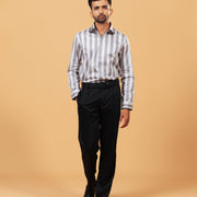 Model wearing silver wide stripe satin shirt full front view