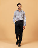 Model wearing silver wide stripe satin shirt full front view