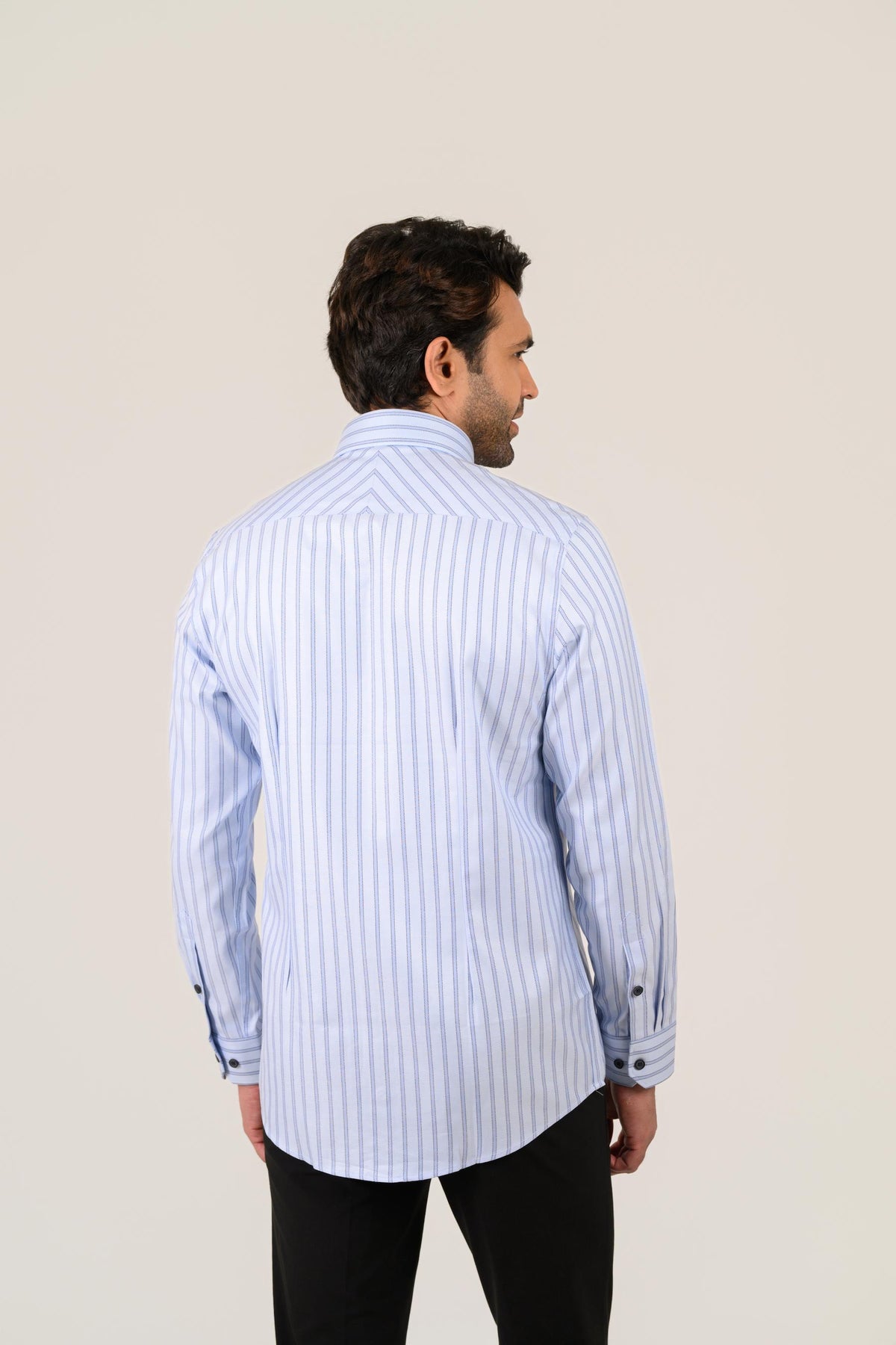 Sky blue striped shirt for men worn by model showing back fit