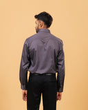 Model back view wearing steel grey Giza satin shirt