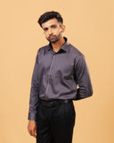 Model wearing steel grey Giza satin shirt front view