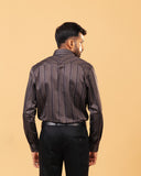 Model back view wearing multicoloured satin stripes shirt