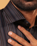 Half side collar view of multicoloured satin stripes shirt on model