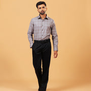 Model wearing light brown Giza twill check shirt full front view