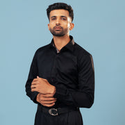 Model wearing black twill shirt front view