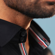 Half side collar view of black twill shirt on model