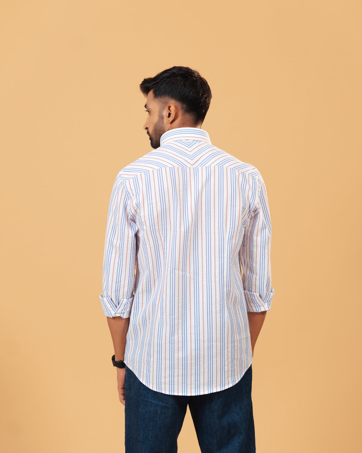 Model back view wearing white seersucker striped shirt