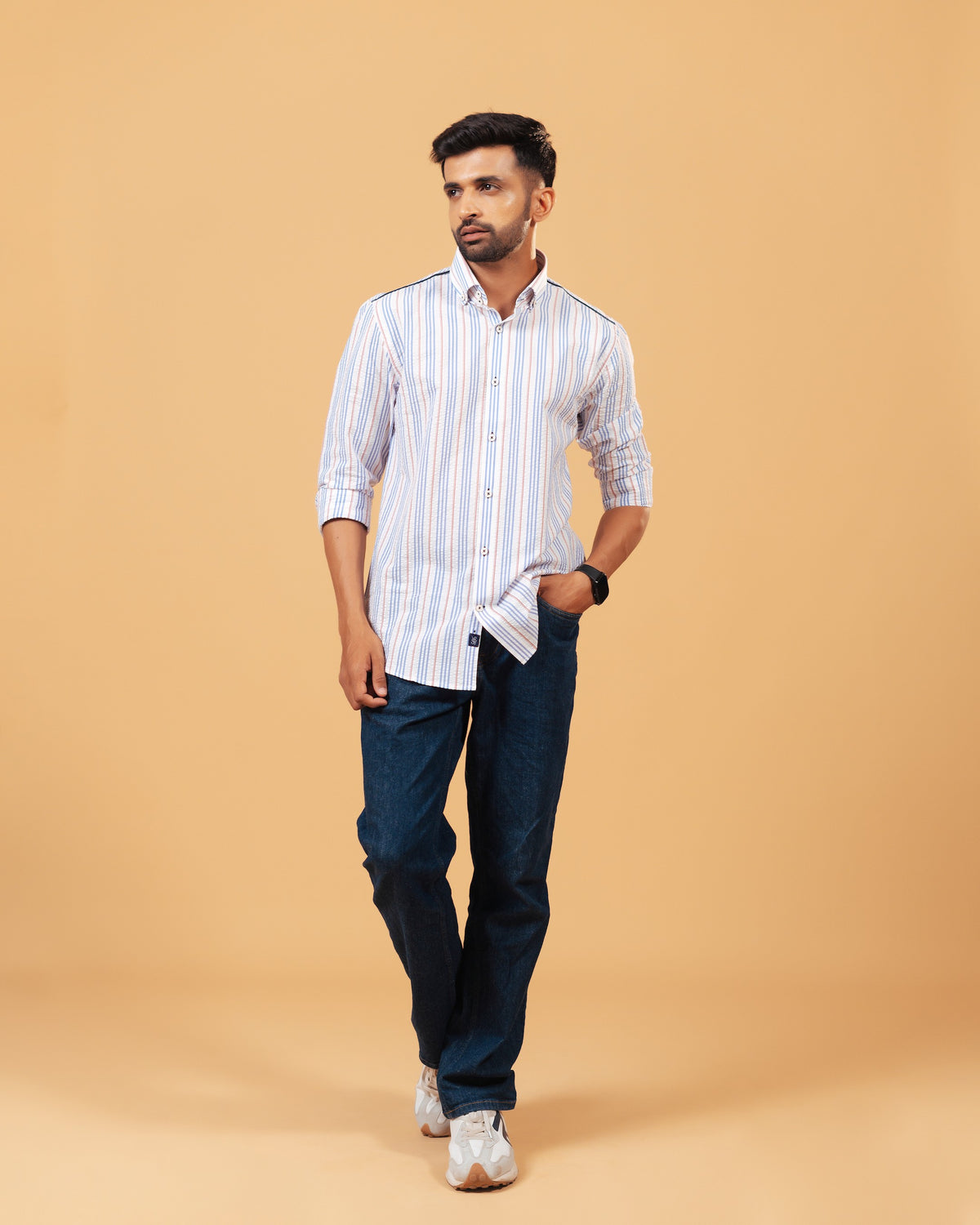 Model wearing white seersucker striped shirt full front view