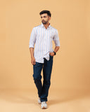 Model wearing white seersucker striped shirt full front view